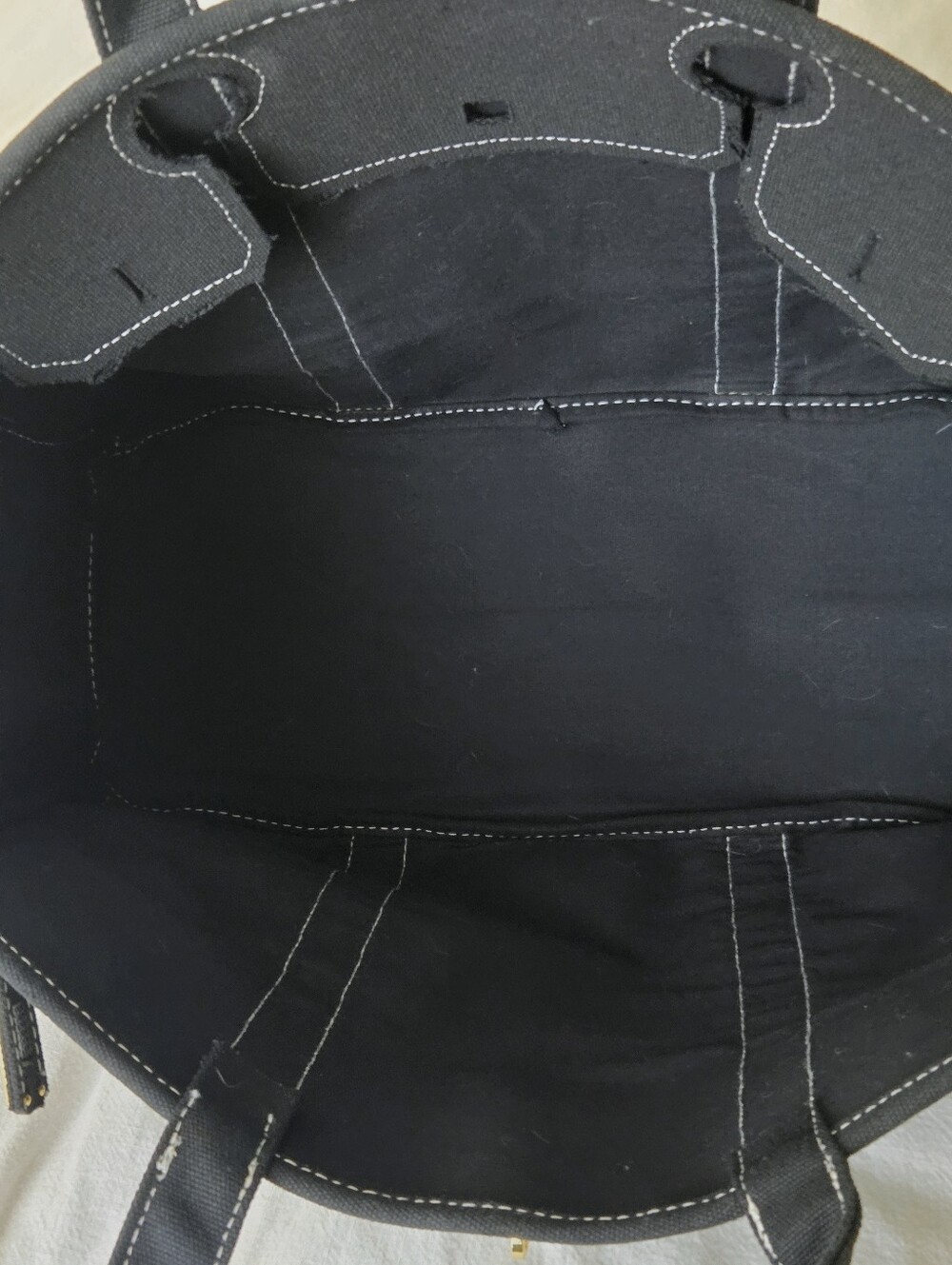Black Canvas Boatkin Tote With White Stitching And Gold Hardware - Picture 4 of 16